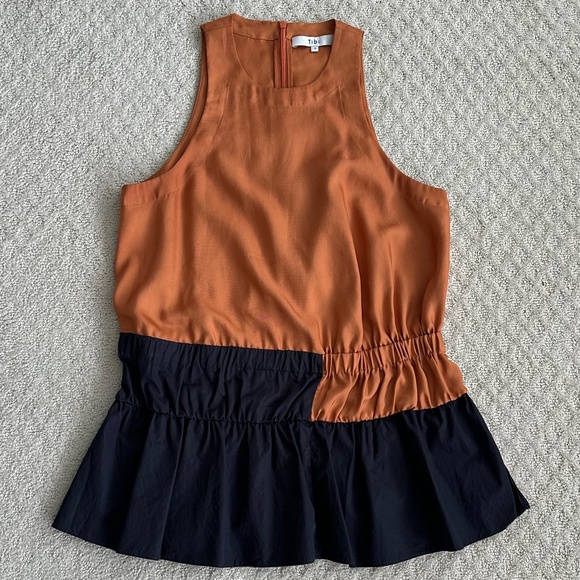 Tibi Sleeveless Color-Blocked Peplum Top Black/Burnt Orange Modern Classic 2 - Picture 1 of 12